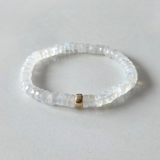 Faceted moonstone crystal bracelet with soft iridescent tones, designed to support intuition, emotional balance, and inner calm.