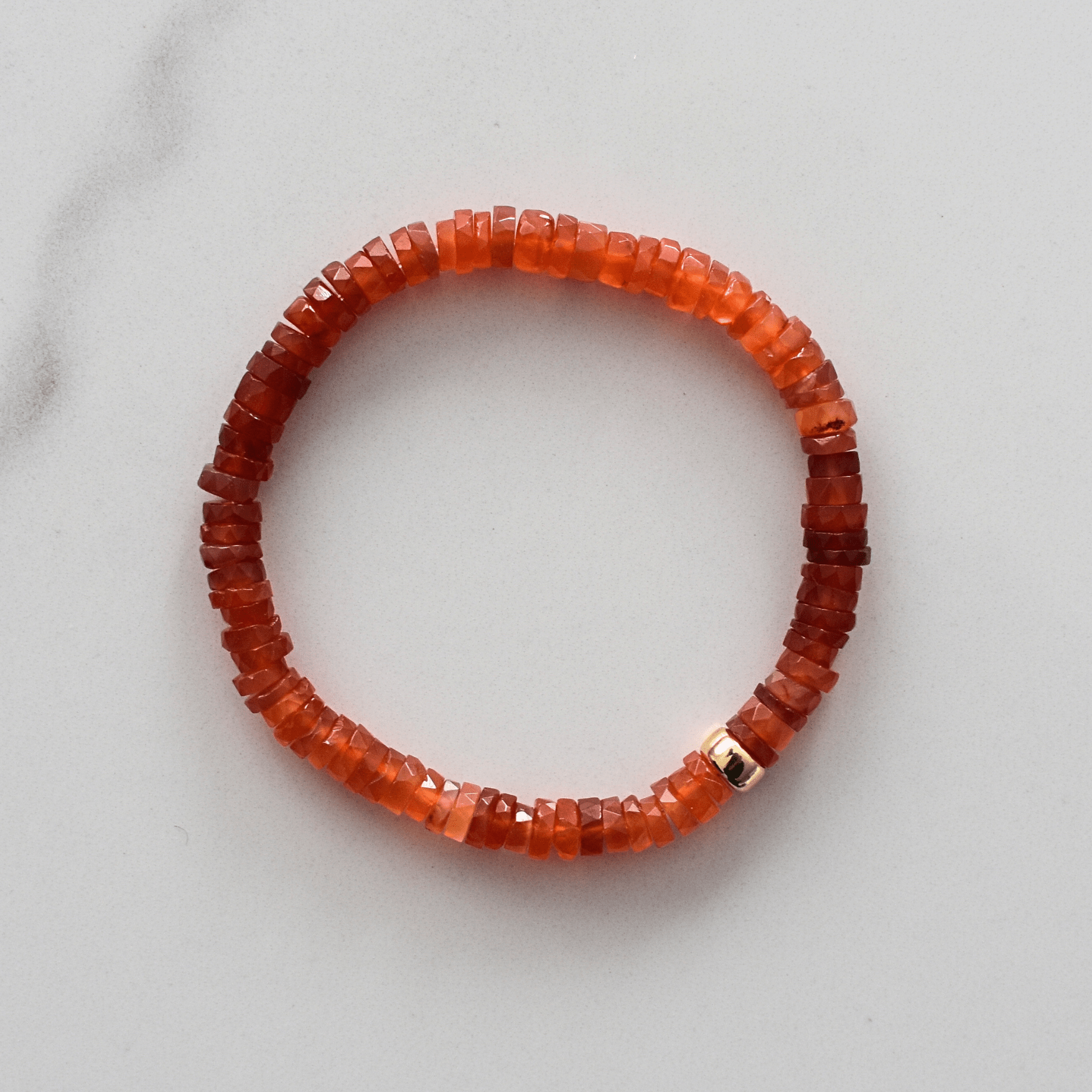 Carnelian Faceted Crystal bracelet with accent bead in 14K filled gold or stainless steel.