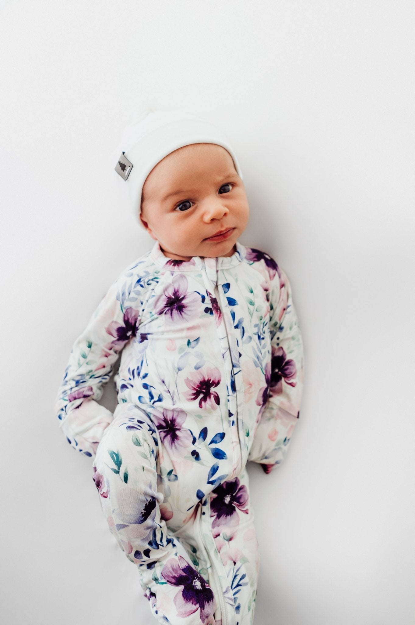 Footed Sleeper in Purple Floral - Bright Earth Apparel