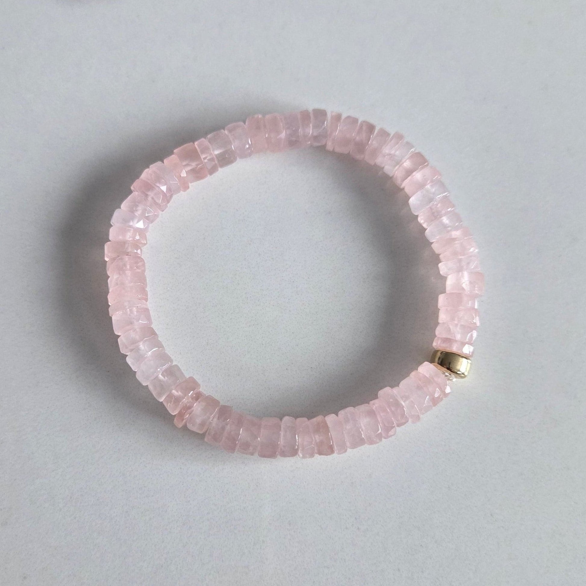 Rose Quartz Faceted Crystal bracelet with accent bead in 14K filled gold or stainless steel.