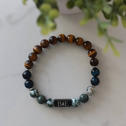 Cancer support crystal bracelet set featuring tiger’s eye, green aventurine, tree agate, aquamarine, selenite, and clear quartz, designed to support strength, resilience, and compassionate connection.